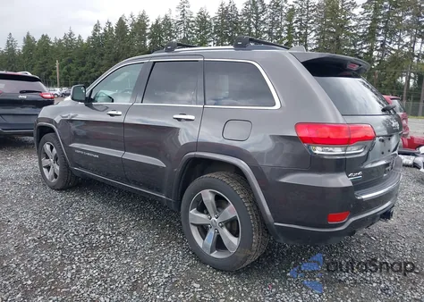 2014 Jeep Grand Cherokee Overland z USA, uszkodzony, nr VIN 1C4RJFCMXEC417525